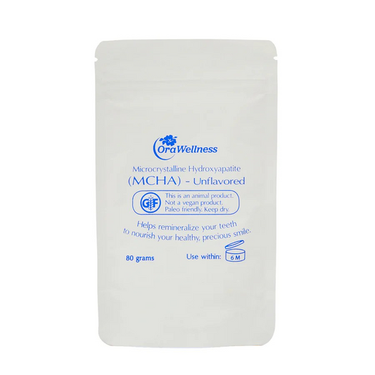 OraWellness dental product packaging on a white background