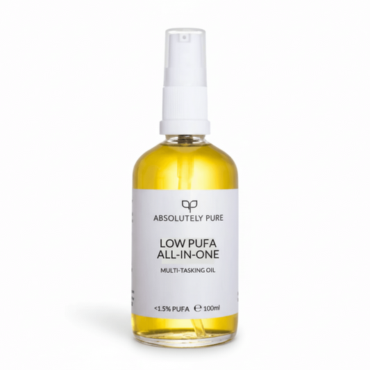 Bottle of Absolutely Pure Low PUFA All-In-One multi-tasking oil on a white background