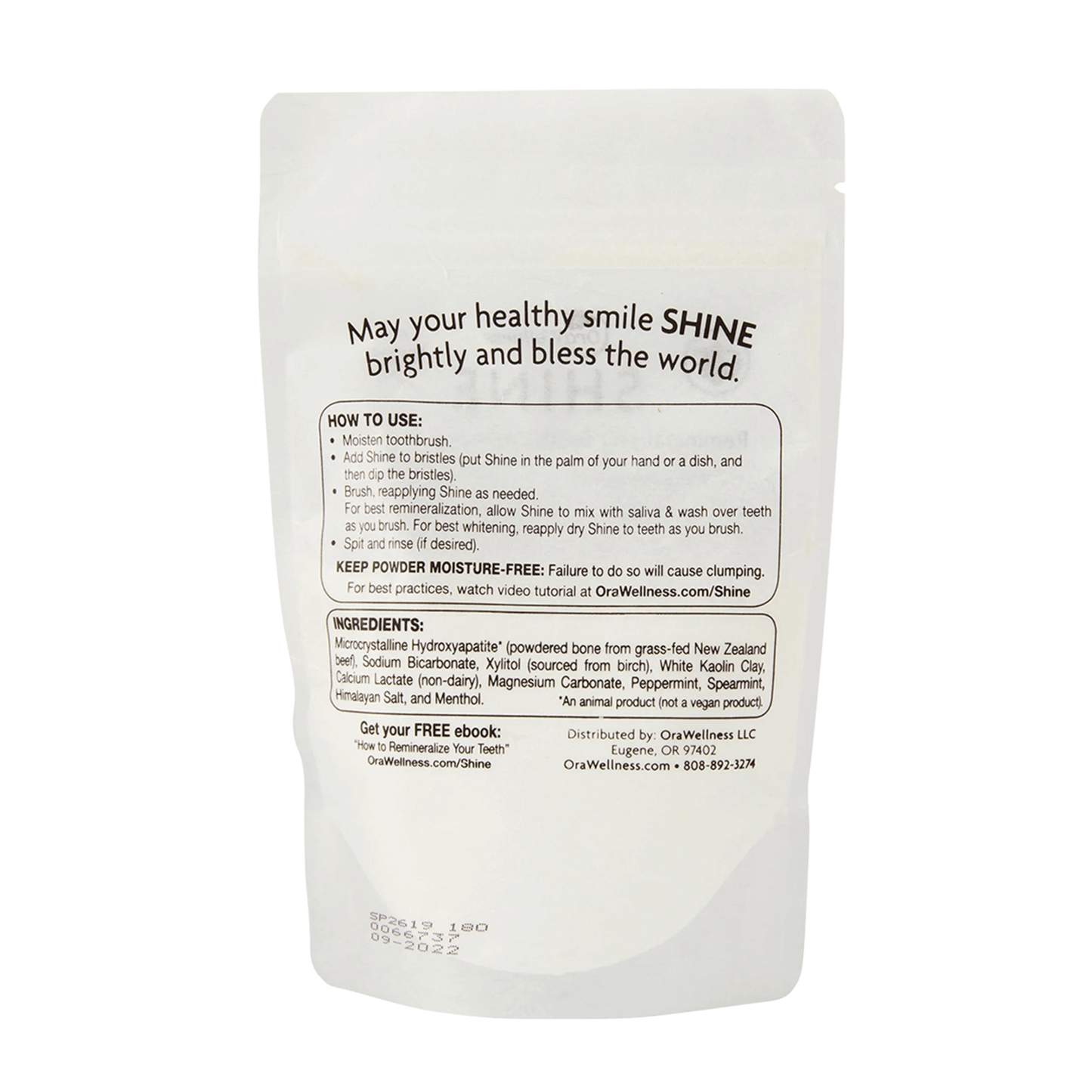 Packaging of Shine Remineralizing Tooth Whitening Powder, with product information and branding visible.