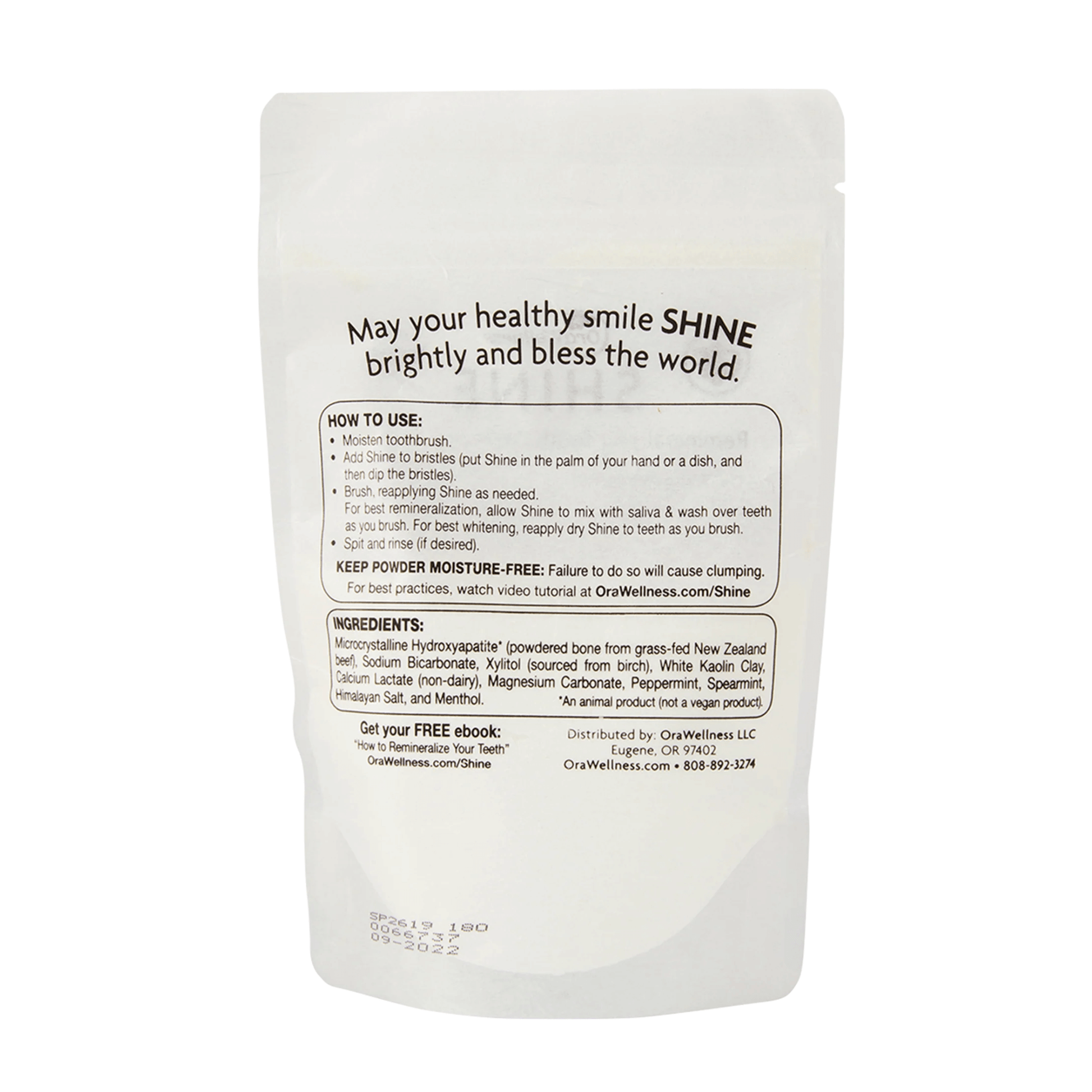 Packaging of Shine Remineralizing Tooth Whitening Powder, with product information and branding visible.