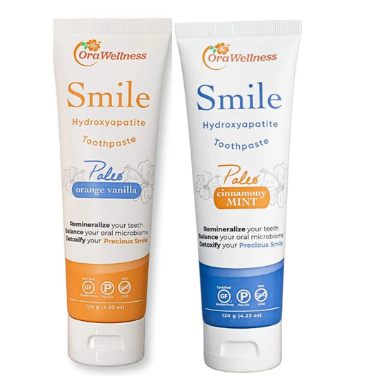 Two tubes of OraWellness Smile Hydroxyapatite Toothpaste on a white background